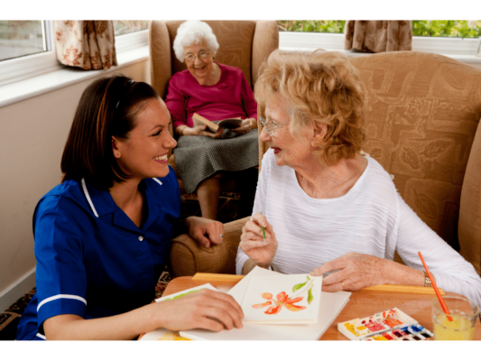 woman helps elderly women